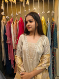 Ivory tissue silk suit set with kali pants and chanderi dupatta by Shirisha