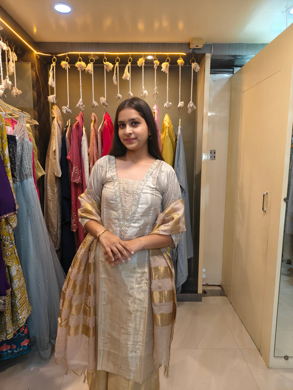 Styled festive look in ivory tissue silk 3-piece ethnic suit set