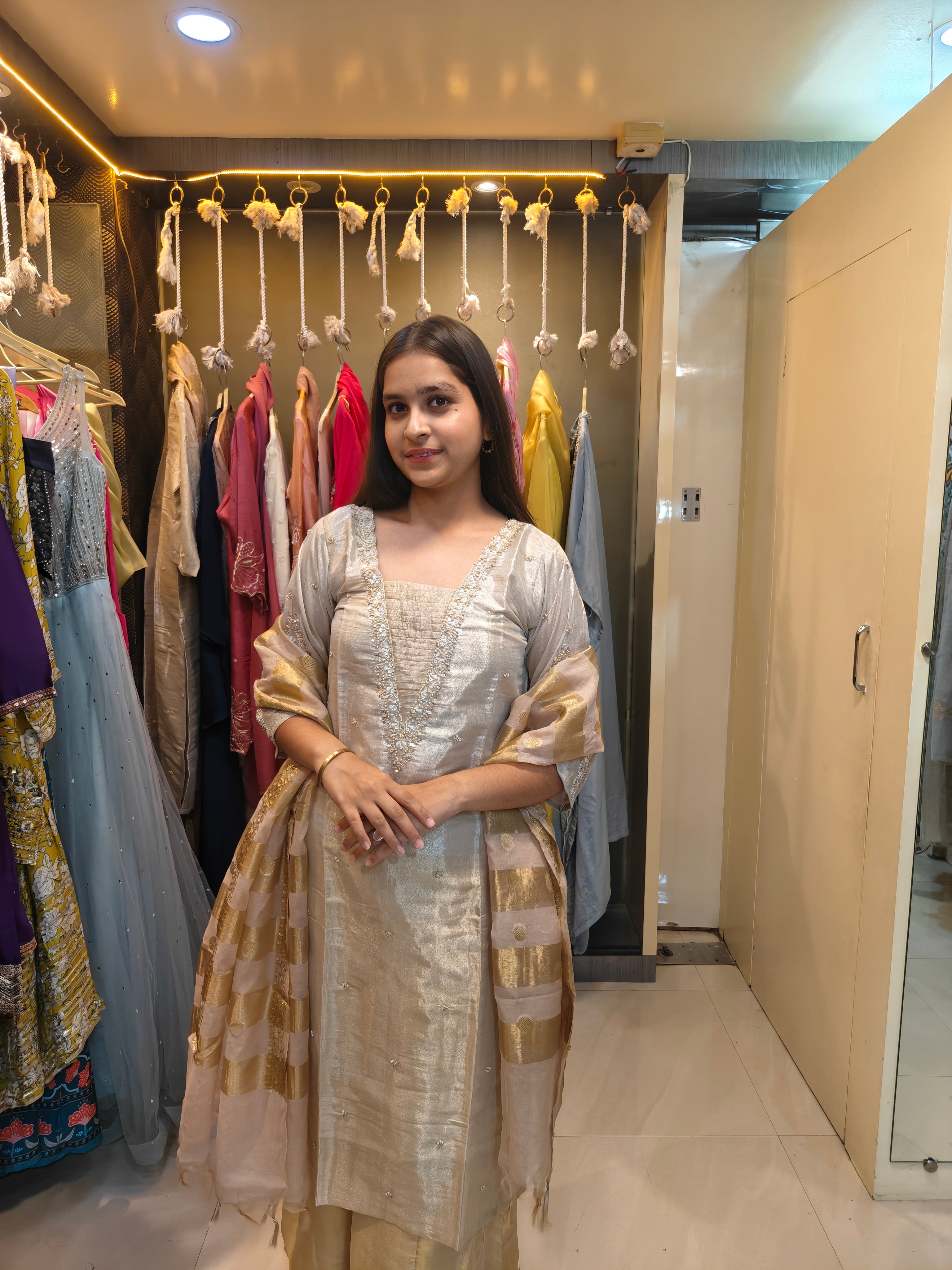 Styled festive look in ivory tissue silk 3-piece ethnic suit set