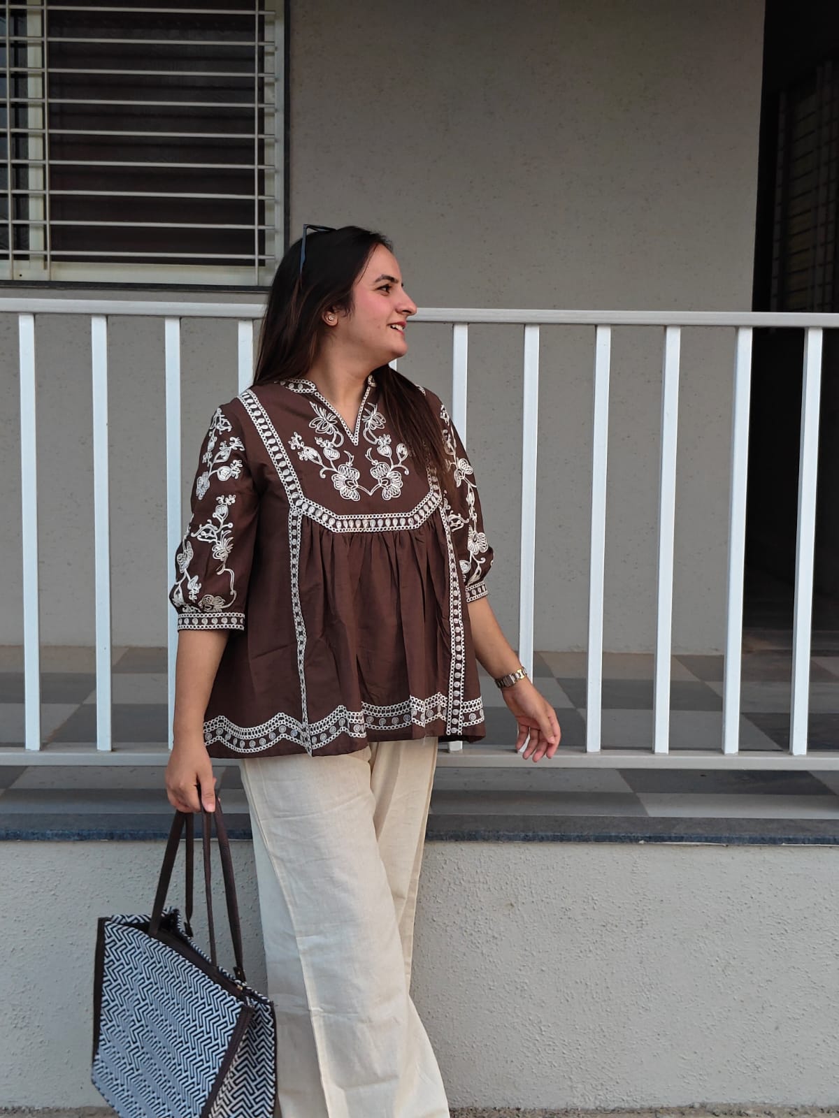 Front view of coffee brown thread-embroidered cotton tunic from Shirisha cord set